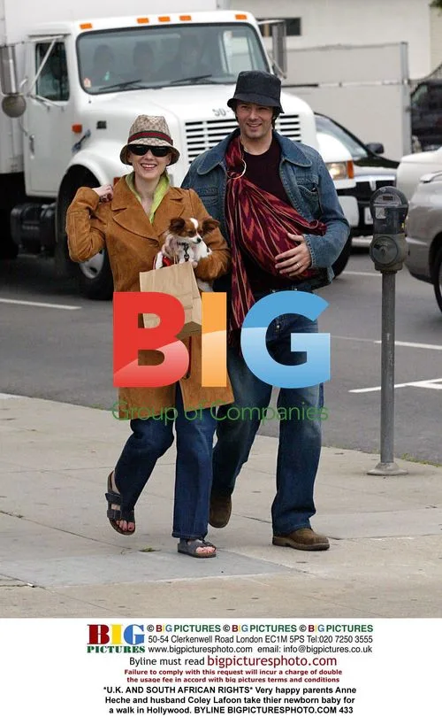 Anne Heche and Coley Lafoon take newborn for walk