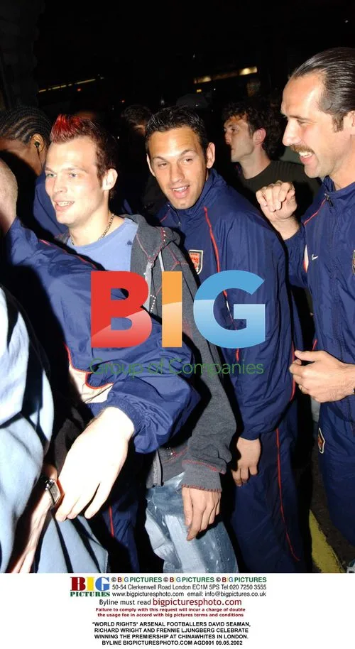 Arsenal footballers celebrate Premiership win