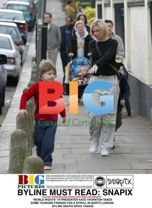 TV Presenter Kate Thornton Takes Friends for Stroll