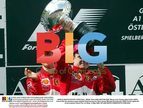 Rubens Barrichello lifts trophy at Austrian GP