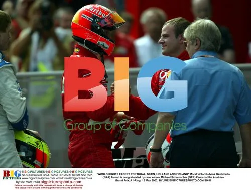 Barrichello congratulated by Schumacher at Austrian GP