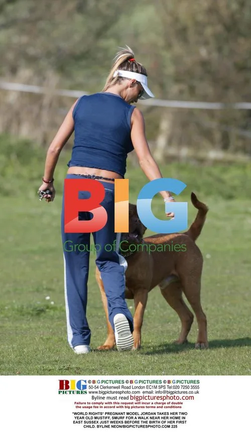 Pregnant model Jordan with dog Smurf