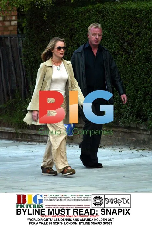 LES DENNIS AND AMANDA HOLDEN OUT FOR A WALK