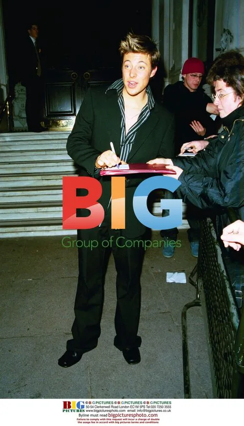 Members of Blue Boy Band Leaving Hotel