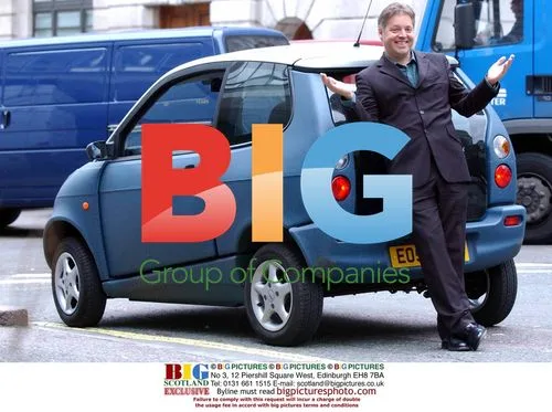 RADIO 1 DJ Mark Goodier with Electric Car