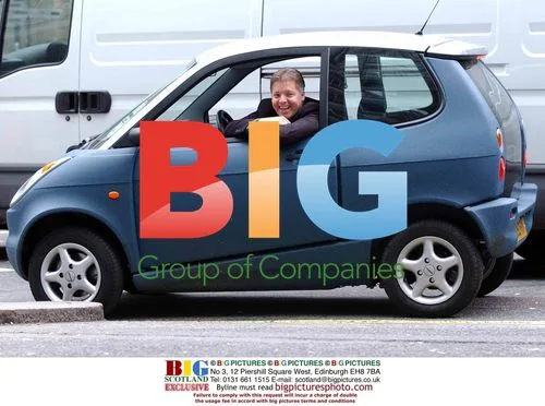 RADIO 1 DJ MARK GOODIER WITH ELECTRIC CAR