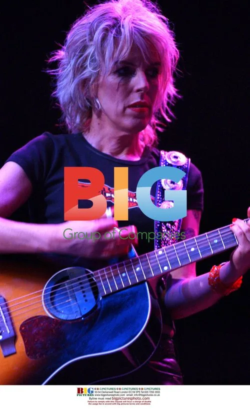 Lucinda Williams performing at DKNY Vanity Fair Concert