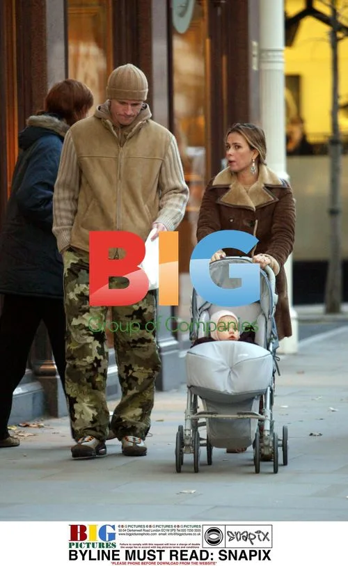 Emmanuel Petit and family out shopping