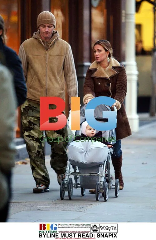 Emmanuel Petit and Wife Shopping in London