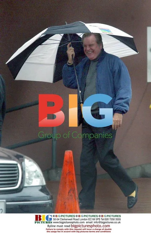 Robert Wagner Caught in Rain in Santa Monica