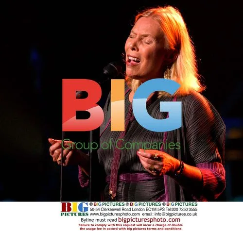 Joni Mitchell performs at Stormy Weather Benefit Concert