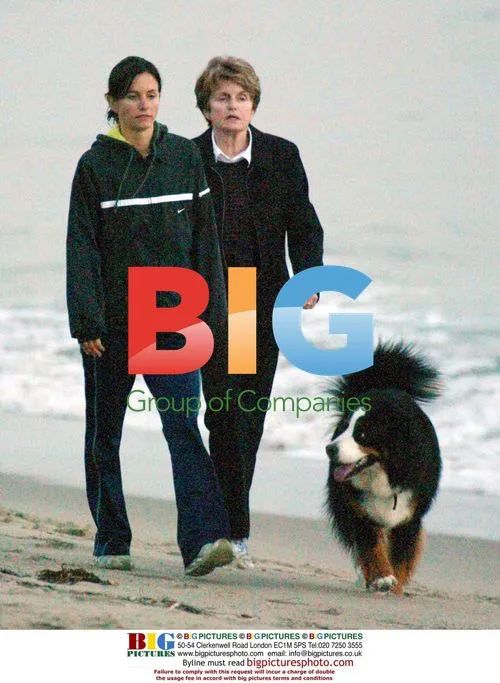 Courtney Cox Arquette and mother walk dogs