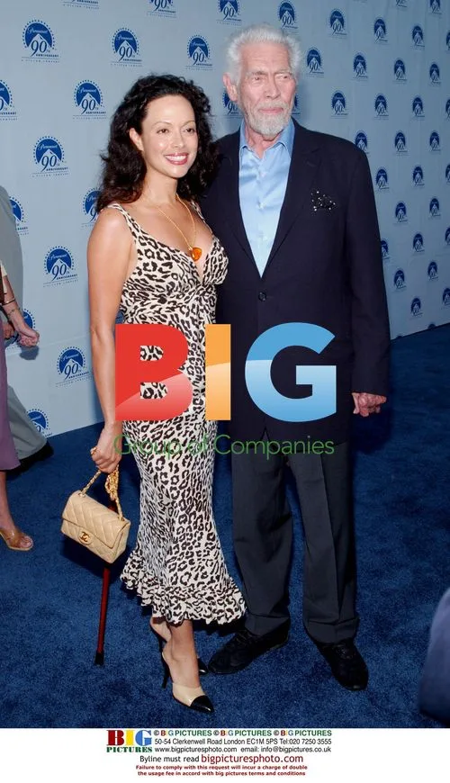 James Coburn and wife arrive at Paramount event