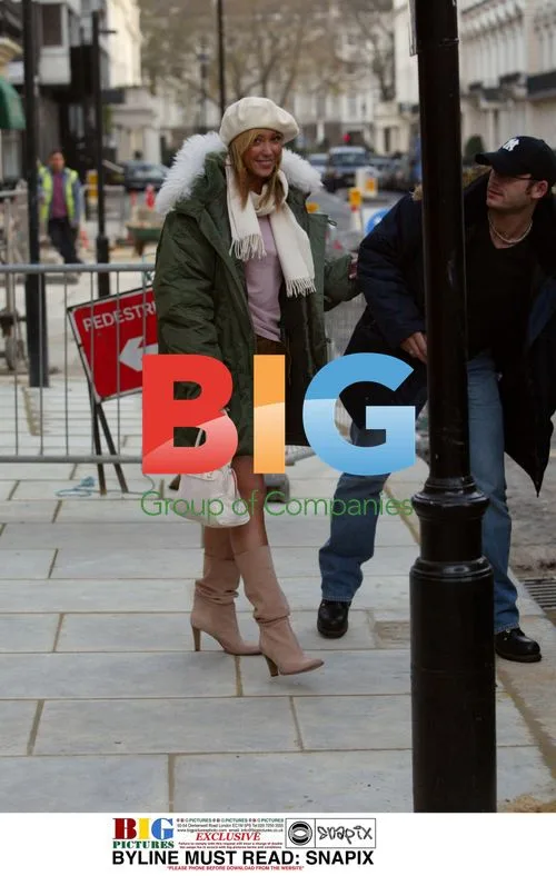 Jenny Frost Laughs with Friend in London