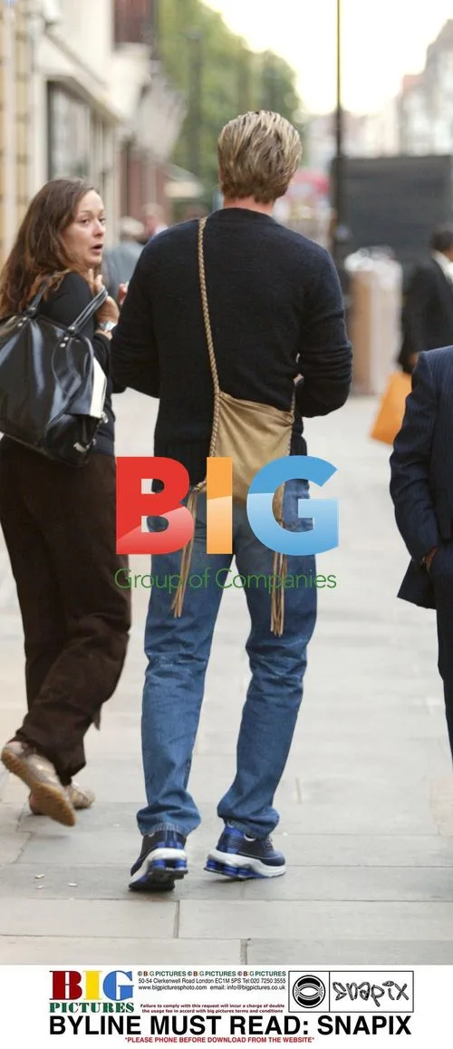 Emmanuel Petit and wife Agathe shopping in London