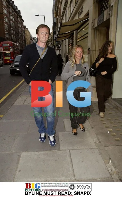 Emmanuel Petit and wife Agathe shopping in London