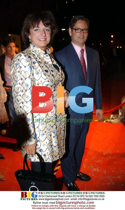 Actors Pose on Red Carpet