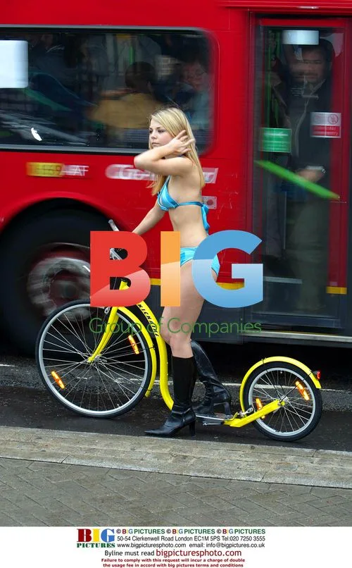 Nickie Theobald Poses on Scooter