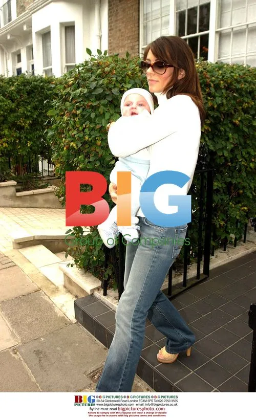 Liz Hurley and baby Damien leave home
