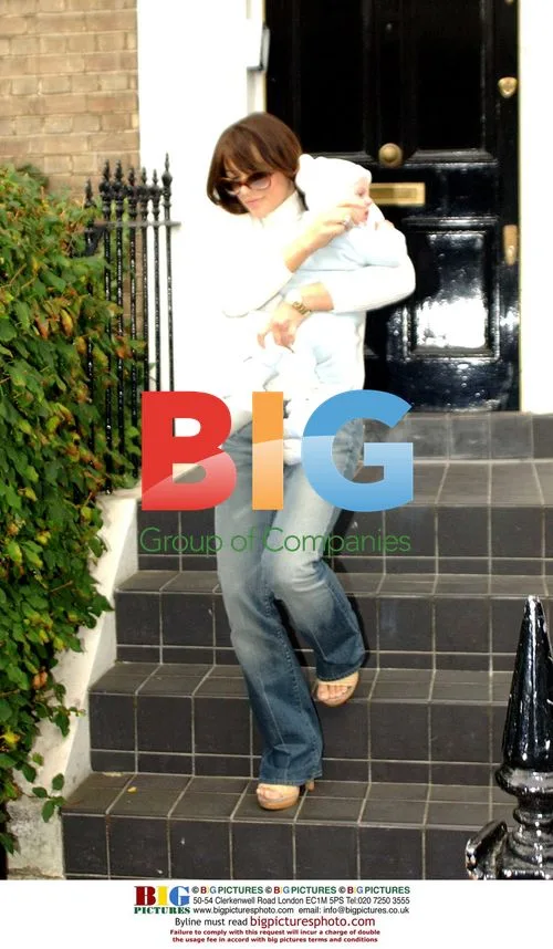 Liz Hurley Leaves Home with Baby Damien