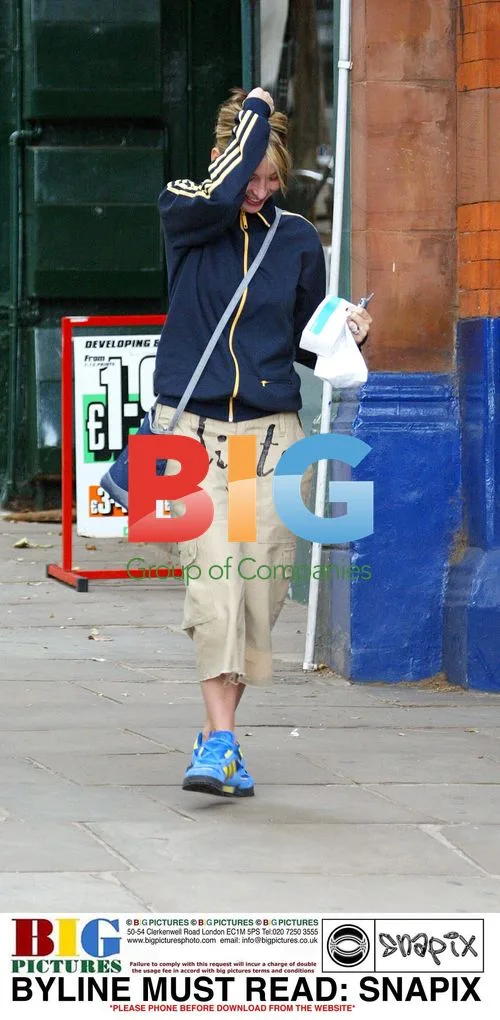 Natalie Appleton Tries to Hide from Paparazzi