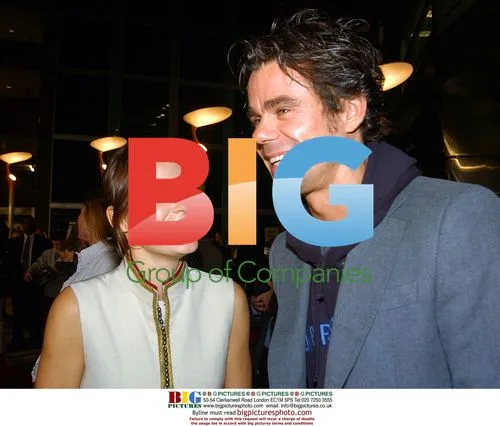 Nicolette Krebitz and Tom Twyker at "All the Queen's Men" premiere