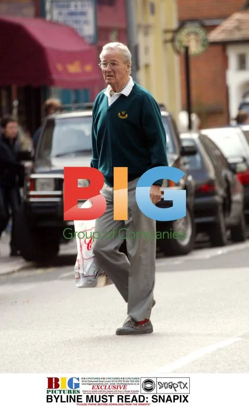 Nicholas Parsons Rushing to Errand