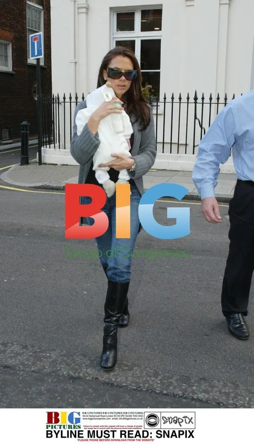 Victoria Beckham and son Romeo visit dentist