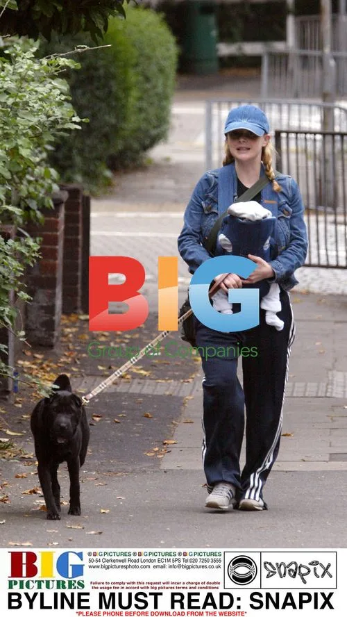 Gail Porter out walking with baby Honey and dog