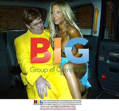 Emma Jones and Elton John Lookalike in Taxi