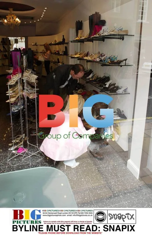 Barbara Windsor Shops for Shoes in Bond Street