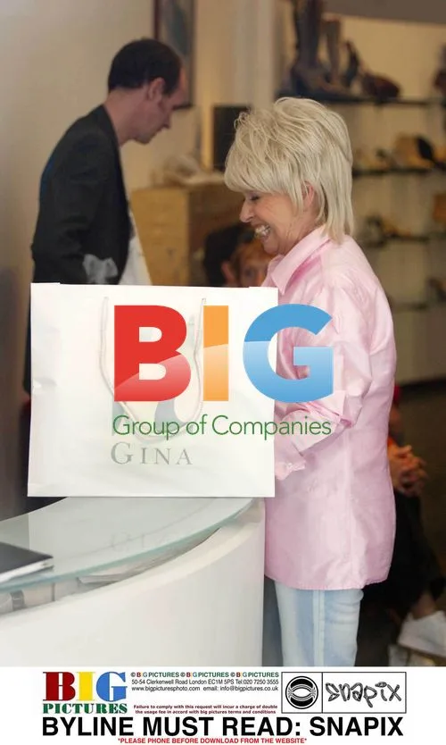 Barbara Windsor Shops for Shoes in Bond Street