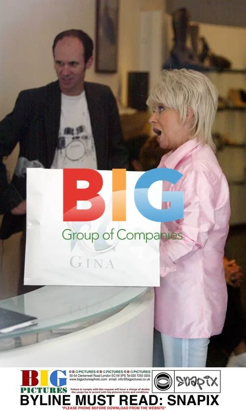 Barbara Windsor Shops at Gina Shoe Boutique
