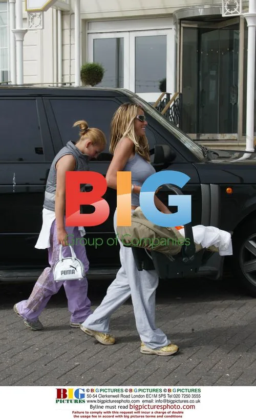Glamour model Jordan with sister Sophie outside hotel