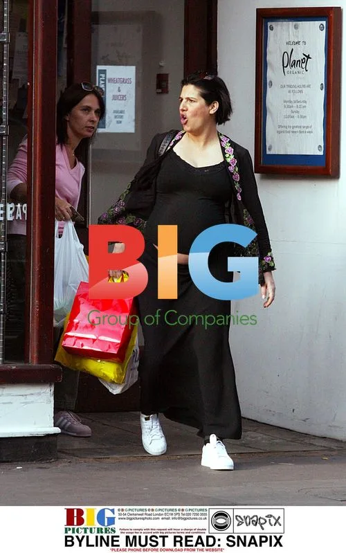 Sharleen Spitery of Texas walks in Notting Hill