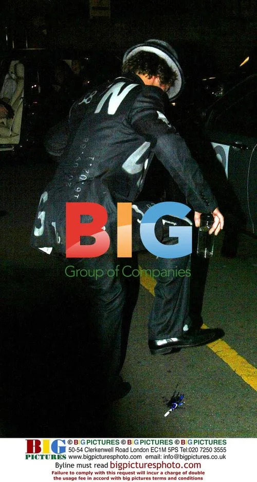 Jay Kay signs autographs at GQ Awards