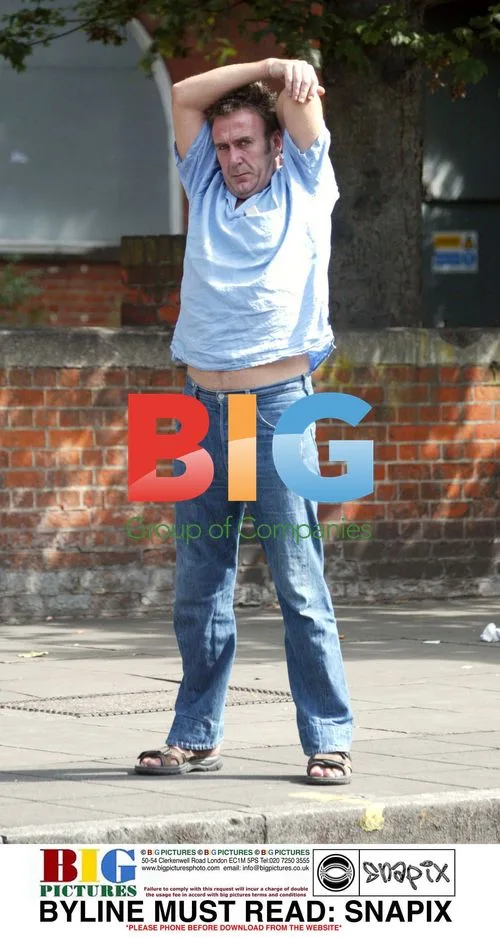 JOE McGANN struggles to get a cab in London