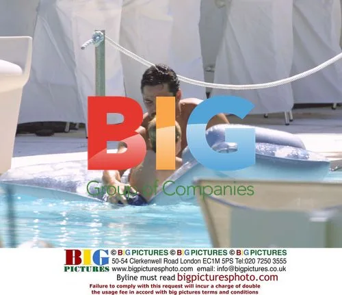 Dean Cain with Samantha Torres and son on Miami Beach