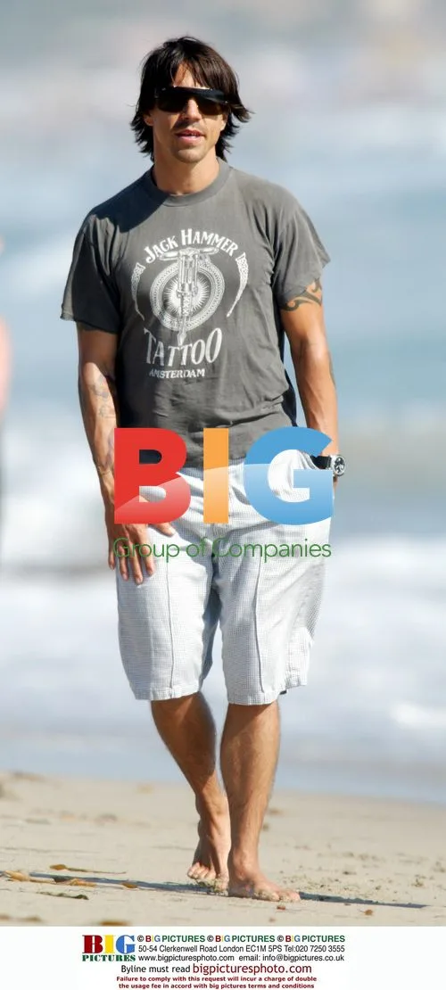Anthony Kiedis with friends on Malibu Beach