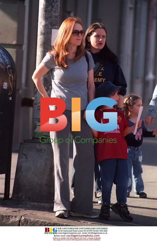 Julianne Moore walks son Caleb to school