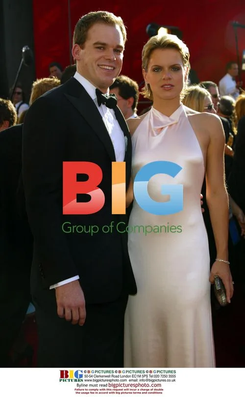 MICHAEL C. HALL & wife AMY SPANGER at 54th Emmy Awards