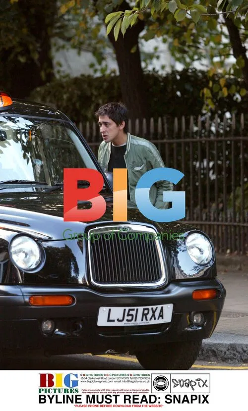 TV Presenter Colin Murray Hails Taxi