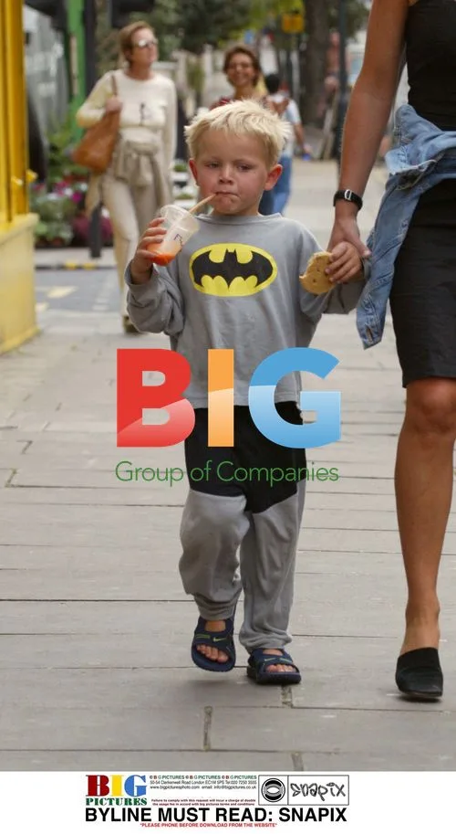 Ali Cockayne and son Henry take lunch break in London