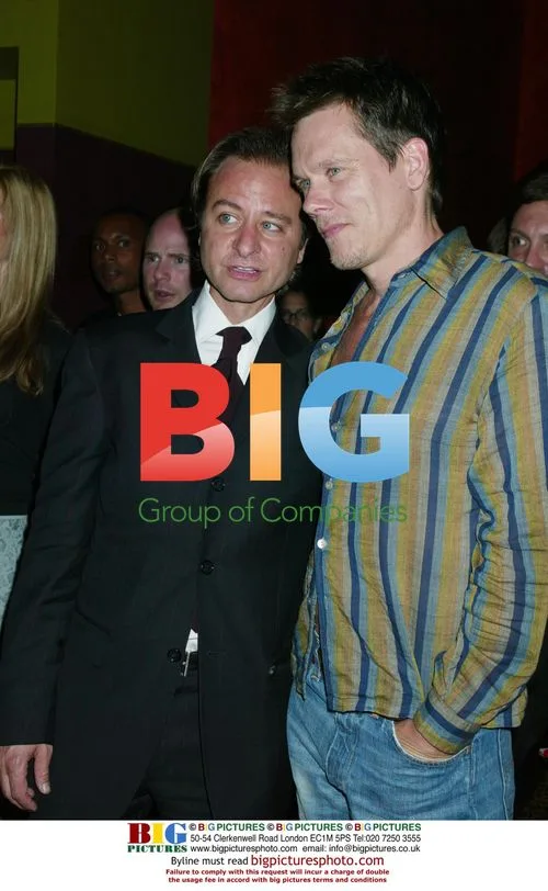 Kevin Bacon and Fisher Stevens at Just A Kiss party