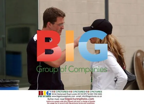 Ralf Schumacher touches wife's nose at 2002 US GP