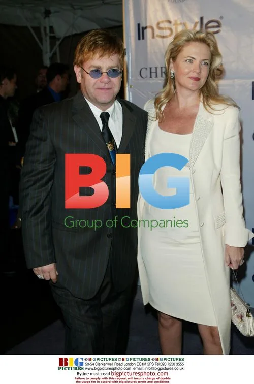 Elton John and Cornelia Guest at Elizabeth Taylor jewelry event