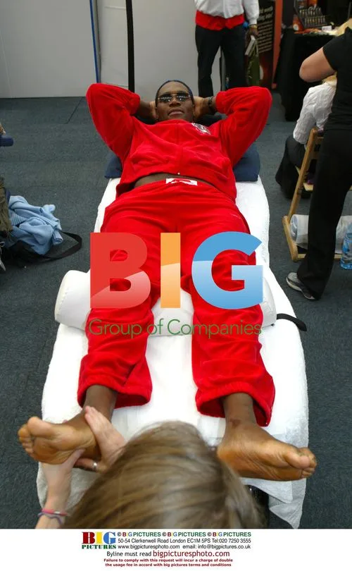 Boxer Audeley Harrison relaxes with massage