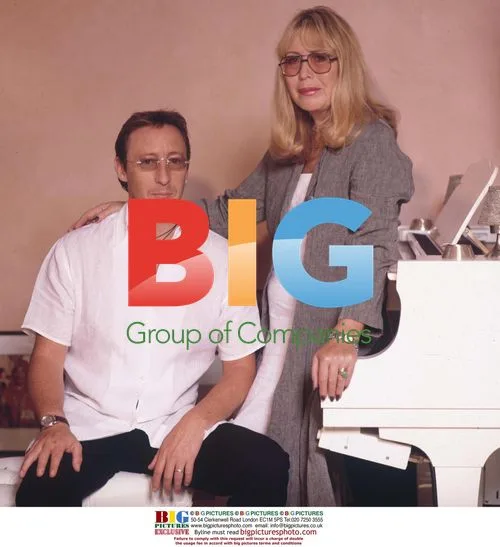 Cynthia and Julian Lennon Pose at Home