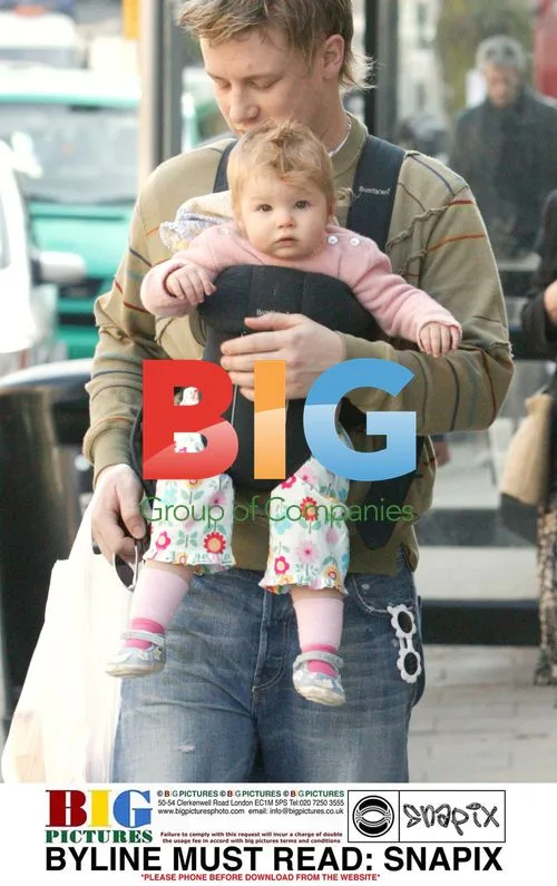 Jamie and Jules Oliver with baby Poppy