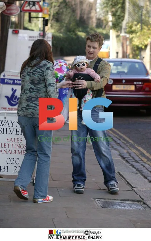 Jamie and Jules Oliver with baby Poppy